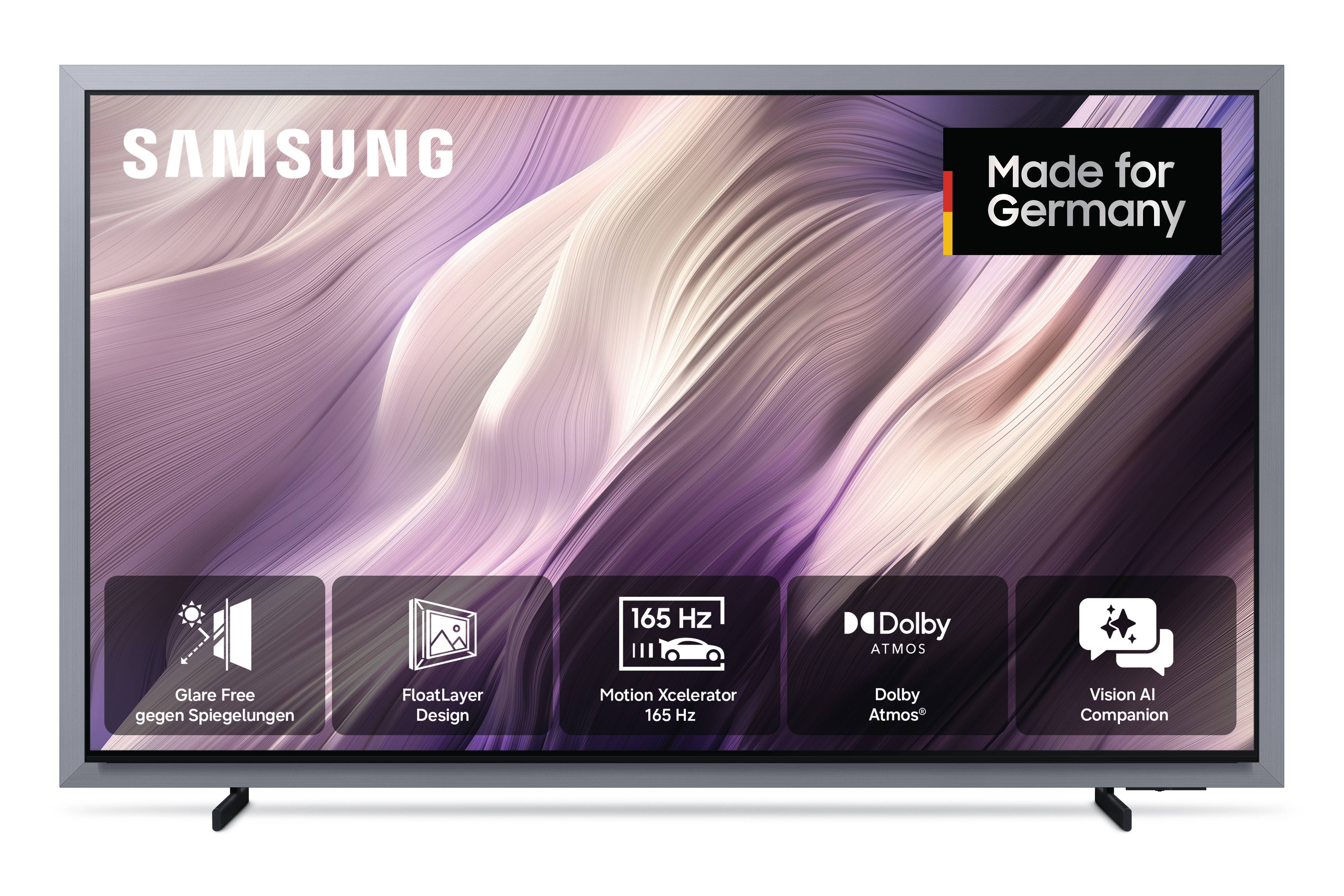 Frontansicht des Samsung OLED S99H Fernseher mit Feature-Icons für Glare Free, Design, 165 Hz, Dolby Atmos und Vision AI.
